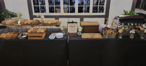 Dessert Station - Variety of Cookies and Cobblers topped with Vanilla Ice Cream